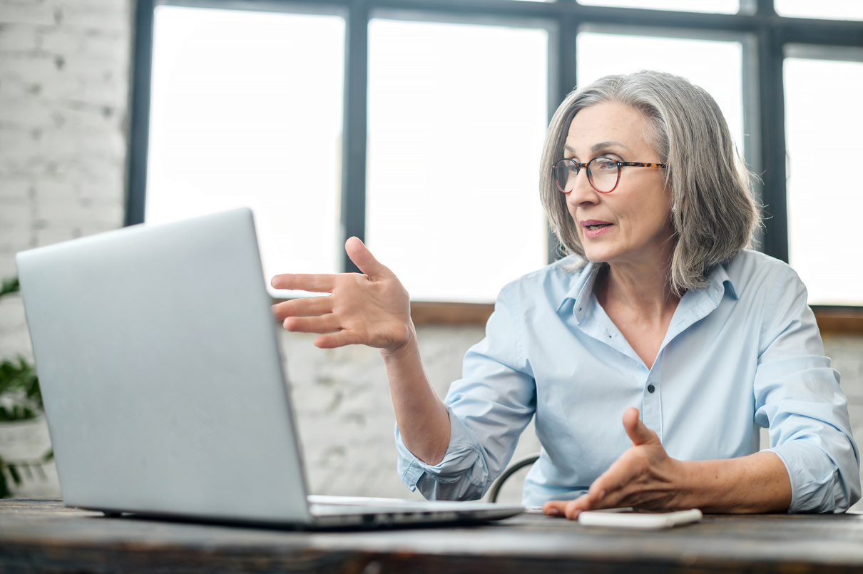 Senior businesswoman having virtual meeting